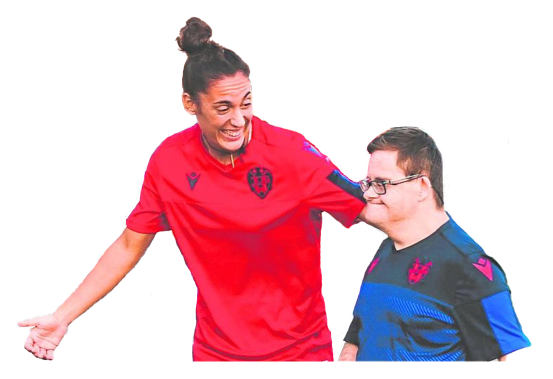 Laura Gutierrez with a disabled football player at the Levante UD foundation