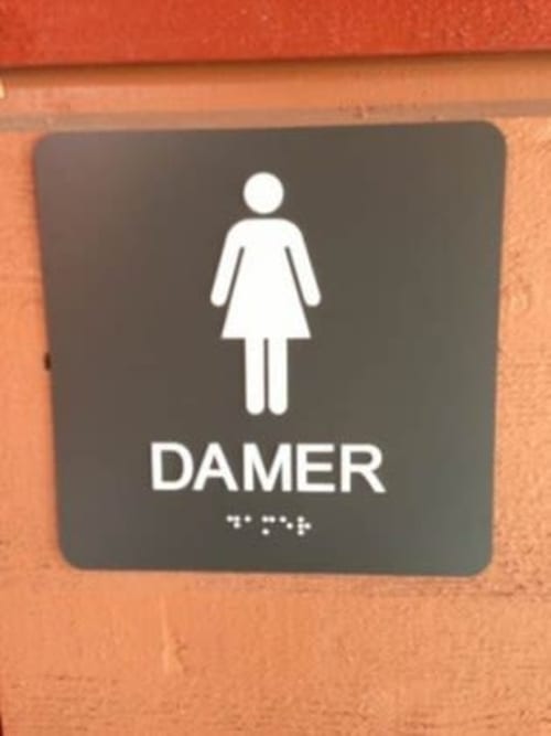 Signage with braille