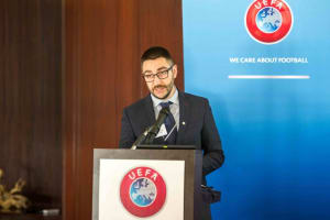 Andrea Zoppis speaking at a UEFA event