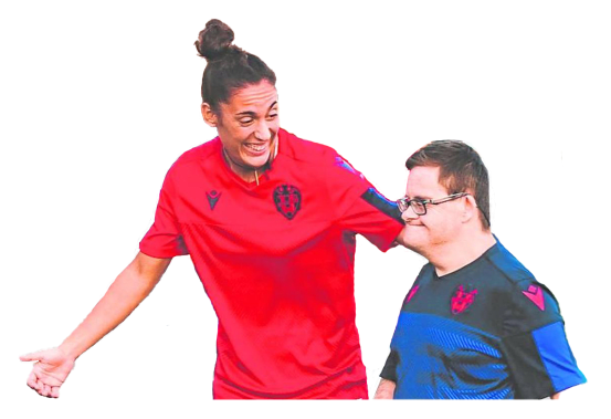 Laura Gutierrez with a disabled football player at the Levante UD foundation